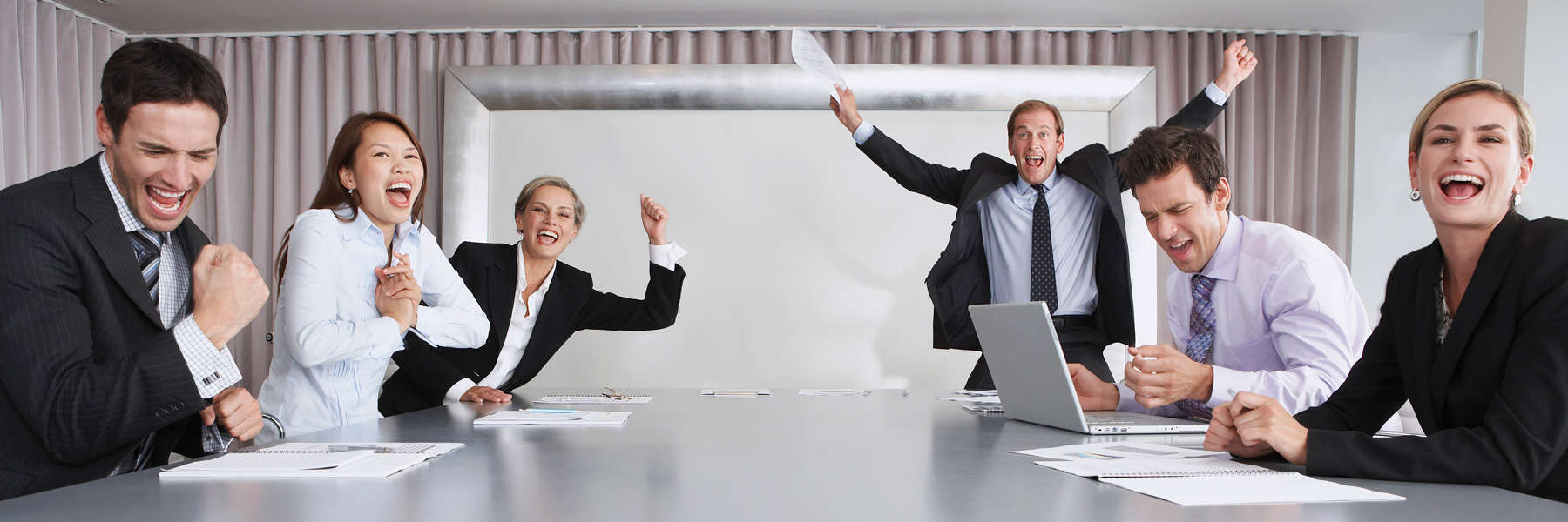 Am-I-fully-covered-under-my-Group-Plan Group of excited office workers